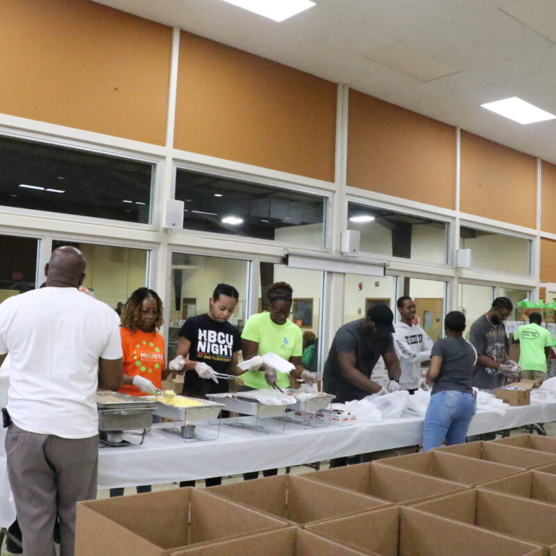 Volunteers distribute food through NLCA’s Food Distribution Center in South DeKalb